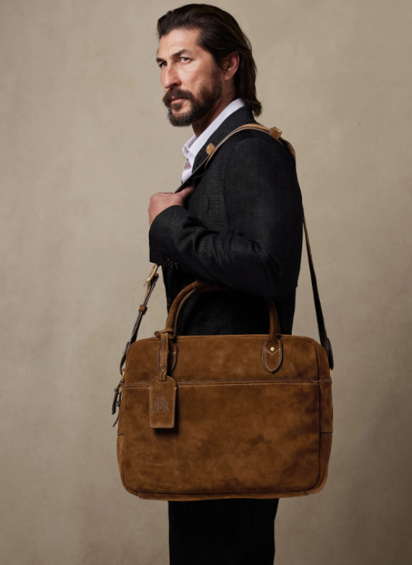 Tas kerja berbahan suede dengan tali kulit